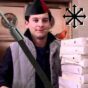 Tobey Maguire's Peter Parker pulls up with a stack of pizzas in Spider-man 2. though in this version he's an avowed anarchist, wearing a black and red CNT hat, smoking a joint, and has an armalite strapped to his back. A Cardinal also rests on his shoulder beneath a floating chaos star